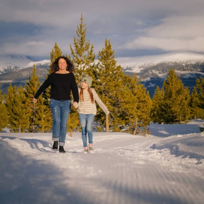 Meara and Mesa walking in the snow