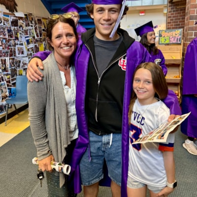 Asher graduating at FVE with Meara and Mesa